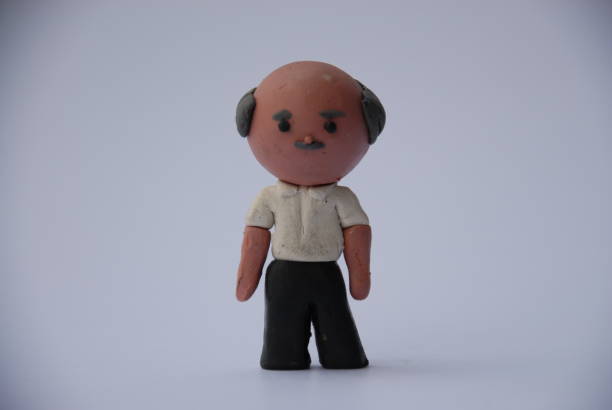 3D rendering in stylized clay of a an elderly man with gray hair.