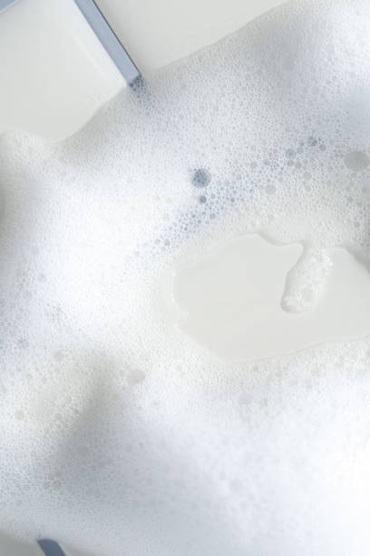 istock Soap Bubbles on Clean White Bathroom Tiles 2184816332