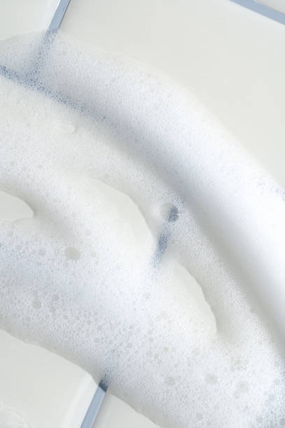 istock Soap Bubbles on Clean White Bathroom Tiles 2184816341
