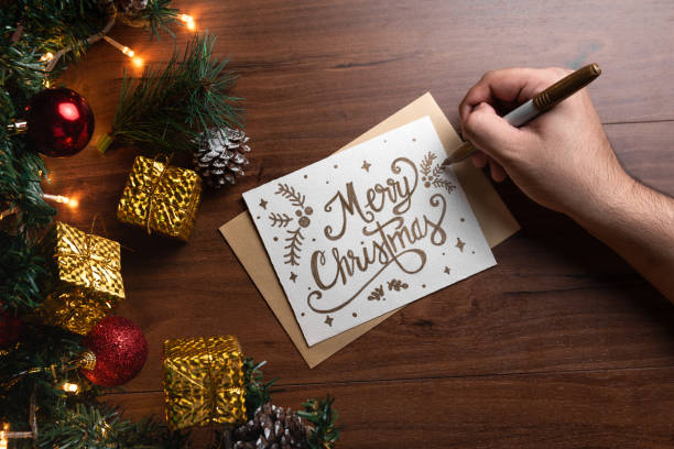 istock Festive Christmas Card with Writing and Holiday Decorations 2184817834