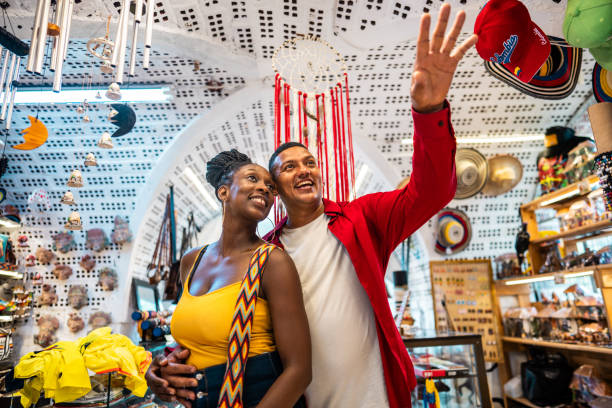 istock Tourist couple talking in a store 2184827950