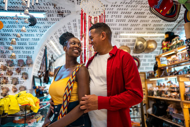 istock Tourist couple talking in a store 2184827955