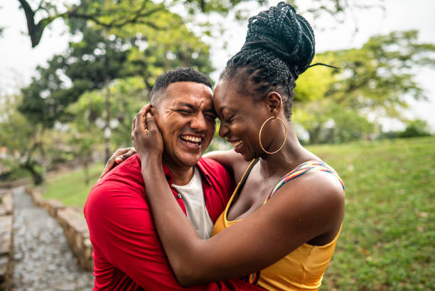 istock Couple talking face to face in a public park 2184828115