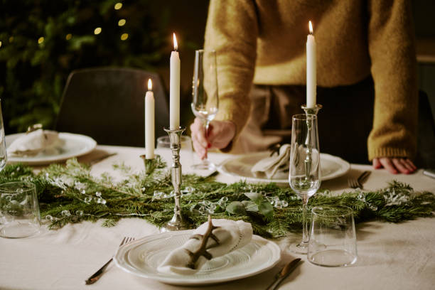 istock Woman in Yellow Sweater Serving Table 2184828610