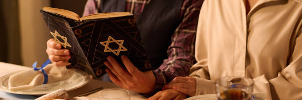 istock Header of Couple Reading Torah 2184834392