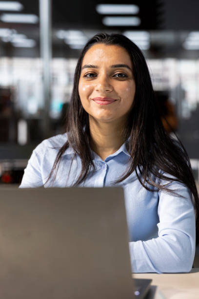 istock Female executive analyst finalizes a financial report and reviews data 2184837925