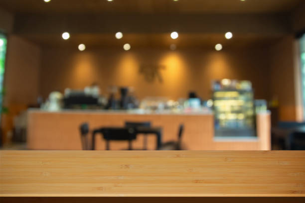 istock Abstract blur interior coffee shop restaurant or cafe and kitchen for background, counter top on of clean abstract home indoor. Warm tone used for display or montage your food dining banner products. 2184840203