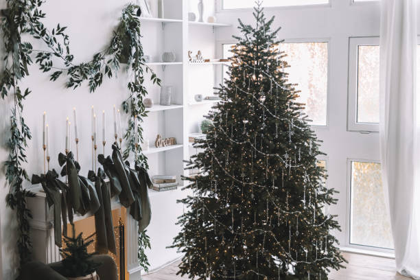 istock Elegant Christmas tree decorated indoors with festive ornaments and greenery 2184840261