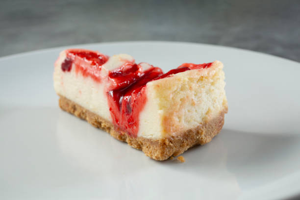 istock slice of strawberry cheesecake 2184841010