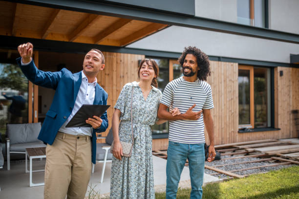 istock Diverse Couple Tours New Home with Agent 2184841741