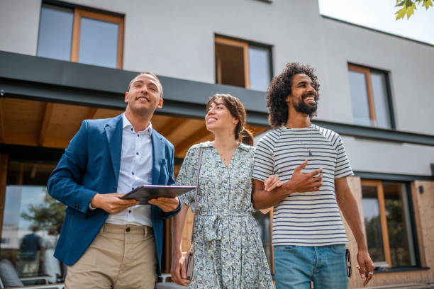istock Diverse Couple Exploring Real Estate Options with Agent 2184841755
