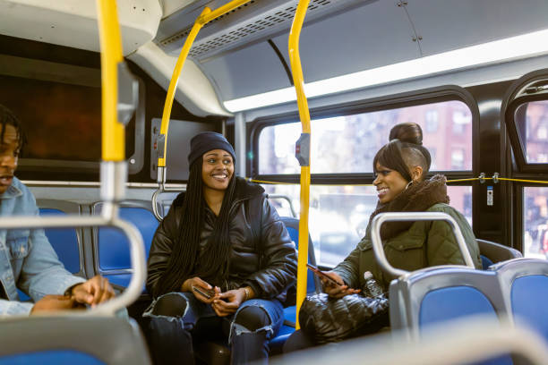 istock Commuters Enjoying a Morning Ride on a City Bus 2184841919