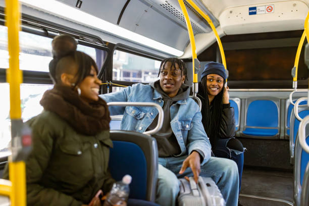 istock Friends Enjoying a Bus Ride During the Day 2184841922