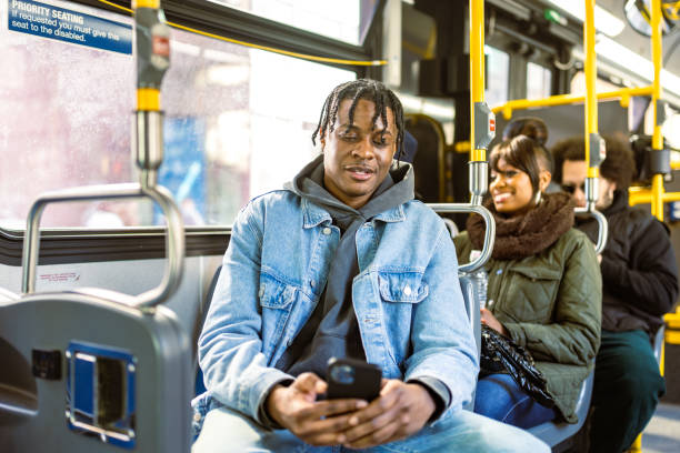 istock Young Adults on a Morning Bus 2184841942