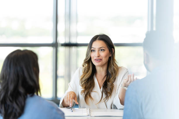 istock Young couple meet with financial planner 2184842037