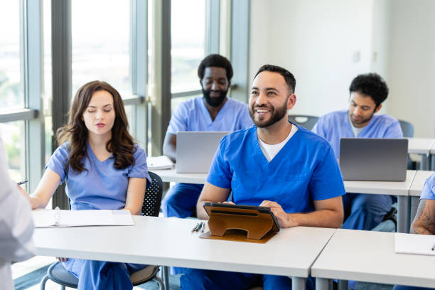 istock Male medical student takes notes during class 2184842127