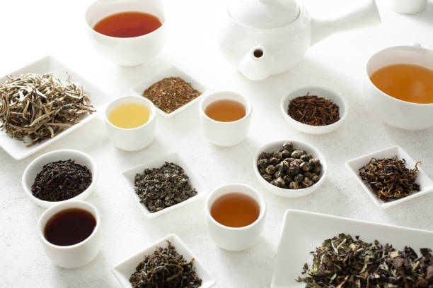 istock assorted tea leaves and tea liquor 2184842615