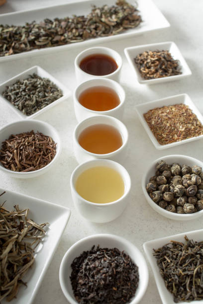 istock tea leaves and tea liquor 2184842658