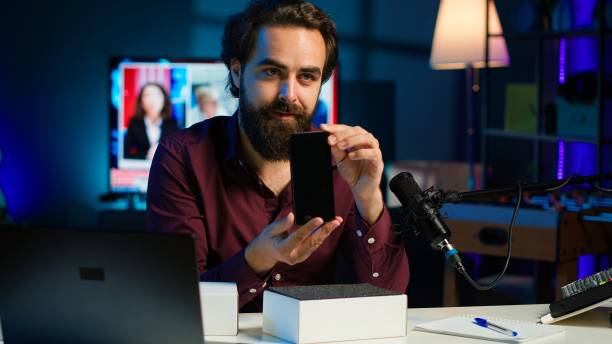 istock Vlogger presenting best smartphones on the market 2184844916