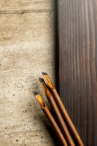 istock Set of calligraphy reeds covered ink on the table 2184854878