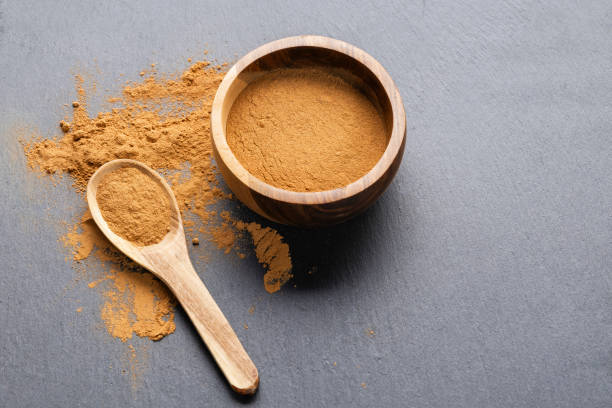 istock Cinnamon Sticks and Powder on Gray Slate 2184868937