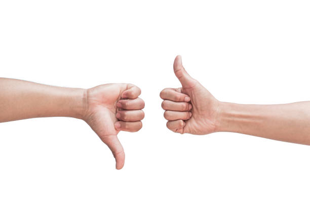 istock male hands like and dislike symbol, isolated on white background 2184873365