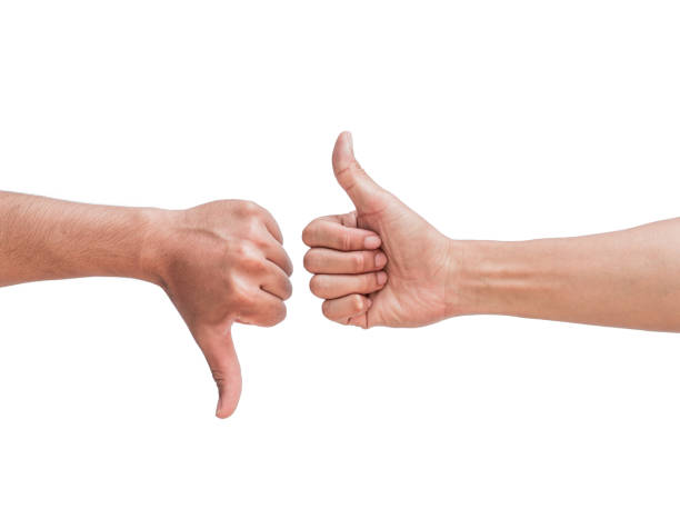 istock male hands like and dislike symbol, isolated on white background 2184873367