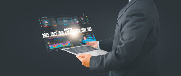 istock Trend 2025 for Business growth and industry concept, businessman using computer with symbol arrow up,stock graph and chart background, investment, Stock market and strategy for making market plan. 2184874509