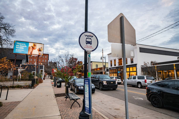 A sign indicating a bus stop for The Rapid, the city bus system on Wealthy Street in Grand Rapids, Michigan stock photo