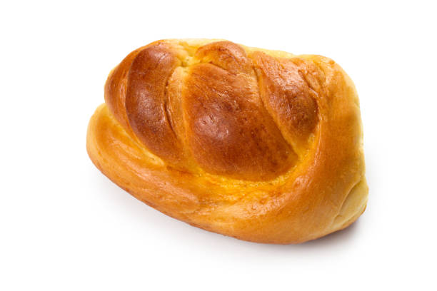 istock One sweet bun isolated on a white background. 2184881617