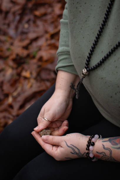 istock Woman grounding herself in nature 2184881900