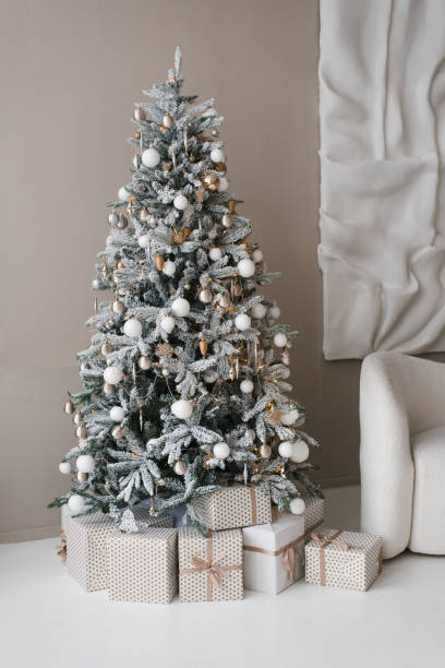 istock Stylish modern Christmas tree in the living room 2184882550