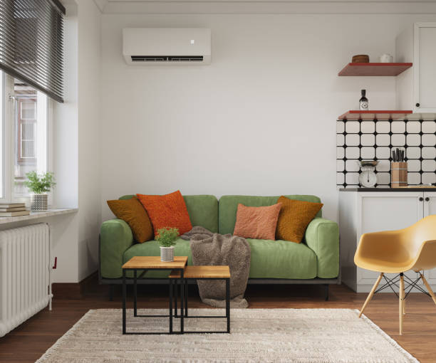 istock Studio room interior with lounge zone and cooking area furnished with sofa and dining table. Modern design solution, 3d rendering 2184883714