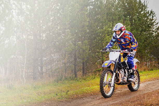 istock Man rides an enduro motorcycle through. Color equipment 2184886959