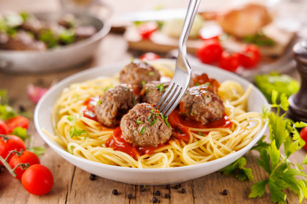 istock spaghetti with tomato sauce, grilled meatball and parmesan cheese 2184889574