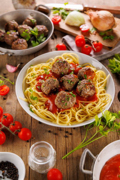 istock spaghetti with tomato sauce and grilled meatball 2184889576