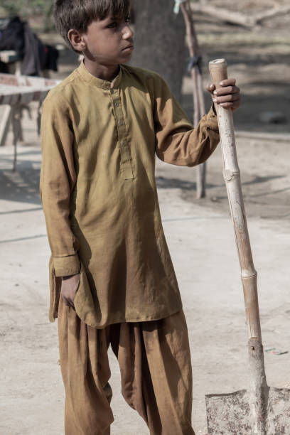 istock Portrait of a Pensive Rural Boy: Capturing Depth and Solitude 2184889834
