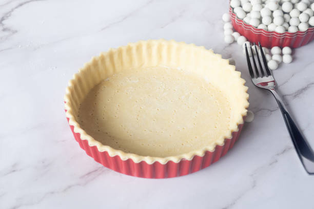 istock pastry pie dough in pie plate preparation for bake. 2184892748
