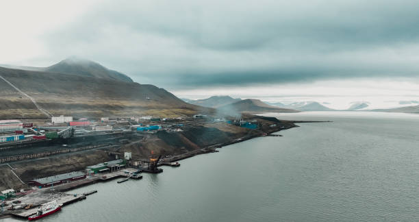 istock Barentsburg, Svalbard showcasing vibrant buildings along the coast under a cloudy sky 2184893647