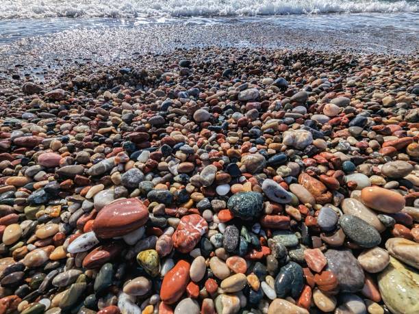 istock colourful stones in the ocean 2184897889