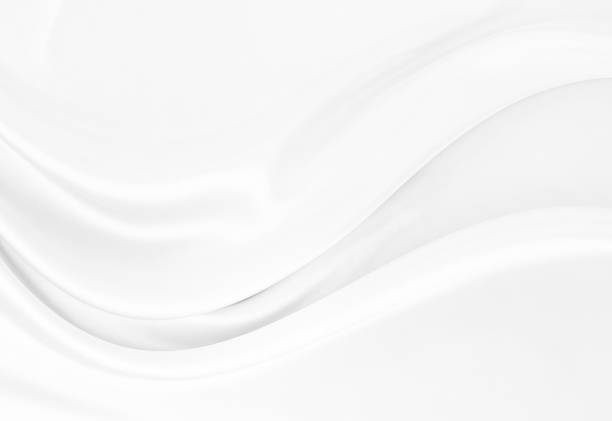 istock White gray satin texture that is white silver fabric silk background with beautiful soft blur pattern natural. 2184899057