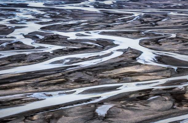 istock Aerial view of braided river patterns. 2184900175