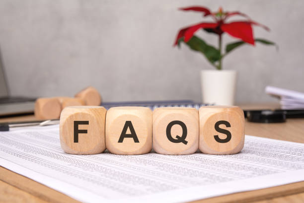 istock A Creative Office Workspace which features FAQs Cubes and a vibrant Green Plant included 2184905997