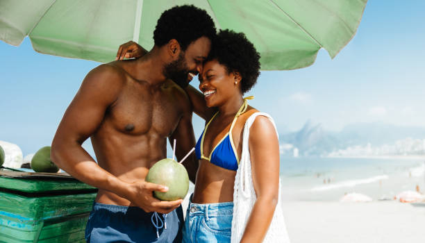 istock Affectionate couple enjoying holiday on a Brazilian beach 2184910160
