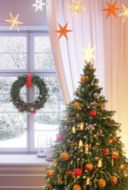 istock A room with a decorated Christmas tree with gifts underneath and a fireplace. 3D render 2184911908