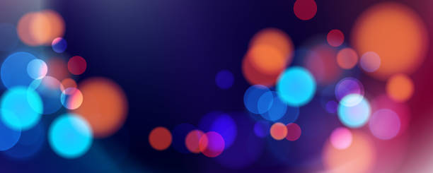 istock Abstract festive blurred background. Vibrant bokeh lights. Bright defocused glowing lights effect. Graphic template for celebration banners and invitations. 2184912644