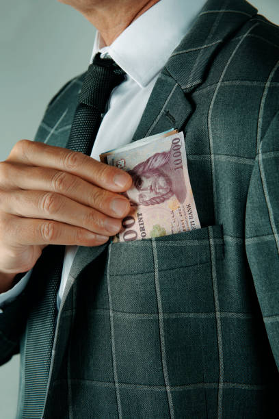 istock businessman takes out forints from his pocket 2184913516