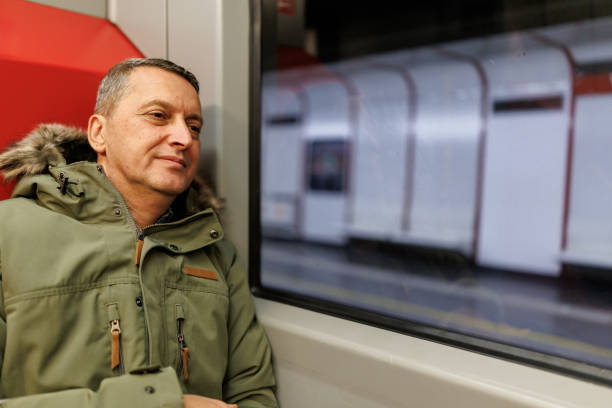 istock Male commuter napping in subway train in the evening 2184914991