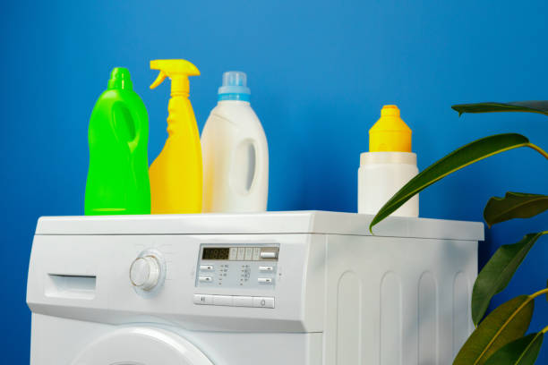 istock Bottle of detergent whith washing machine, indoors 2184923018