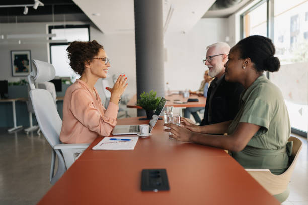 istock Engaging business discussion in contemporary office space 2184924904